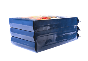 Stacked Pope Pinch® woven bottom bags – featured in our sustainable packaging brochures